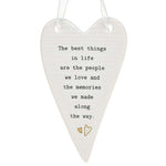 Thoughtful Words Heart shaped hanging plaque Home with the message 'The best things in life are the people we love and the memories we made along the way' love hearts design