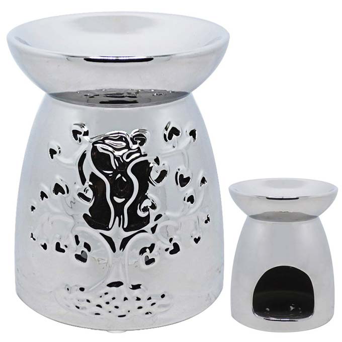 
                  
                    Silver Tree Of Life Wax Oil Warmer white background showing back of tealight holder
                  
                
