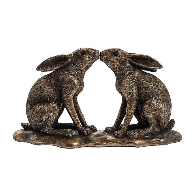 reflections bronze hares kissing